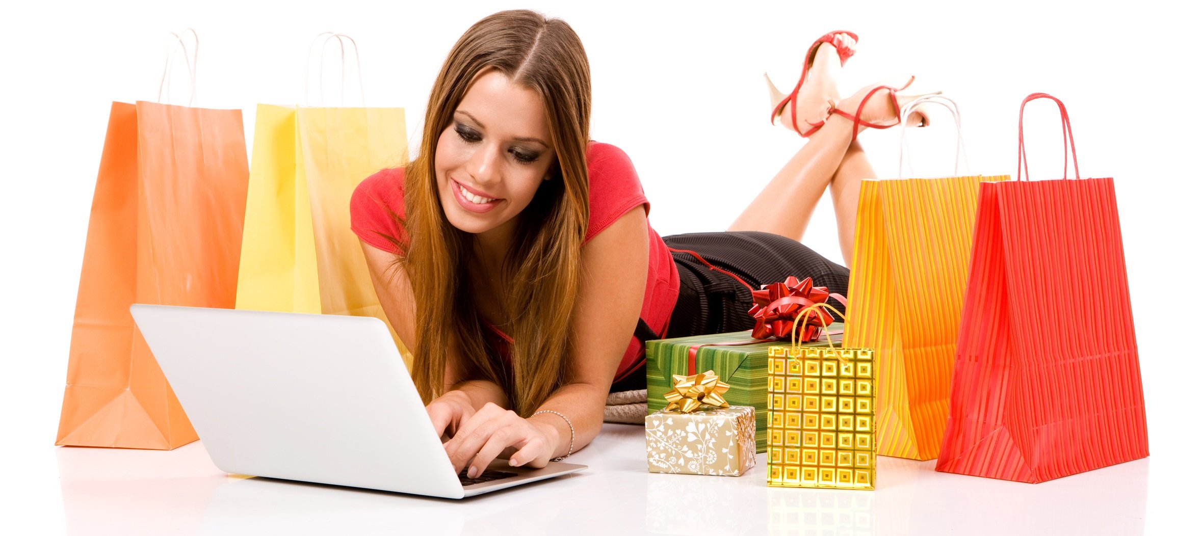 Beautiful young woman shopping over internet.